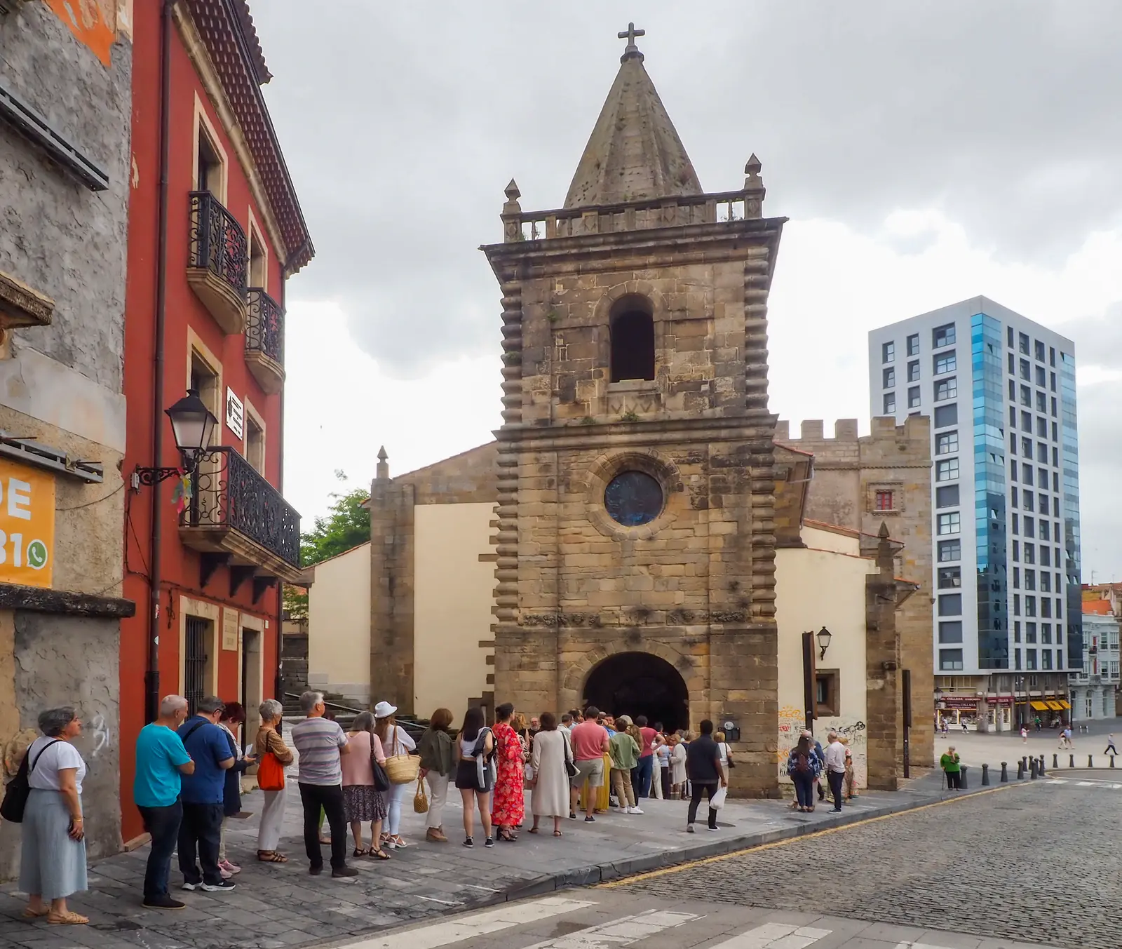 The audience queuing at the entrance to the concert