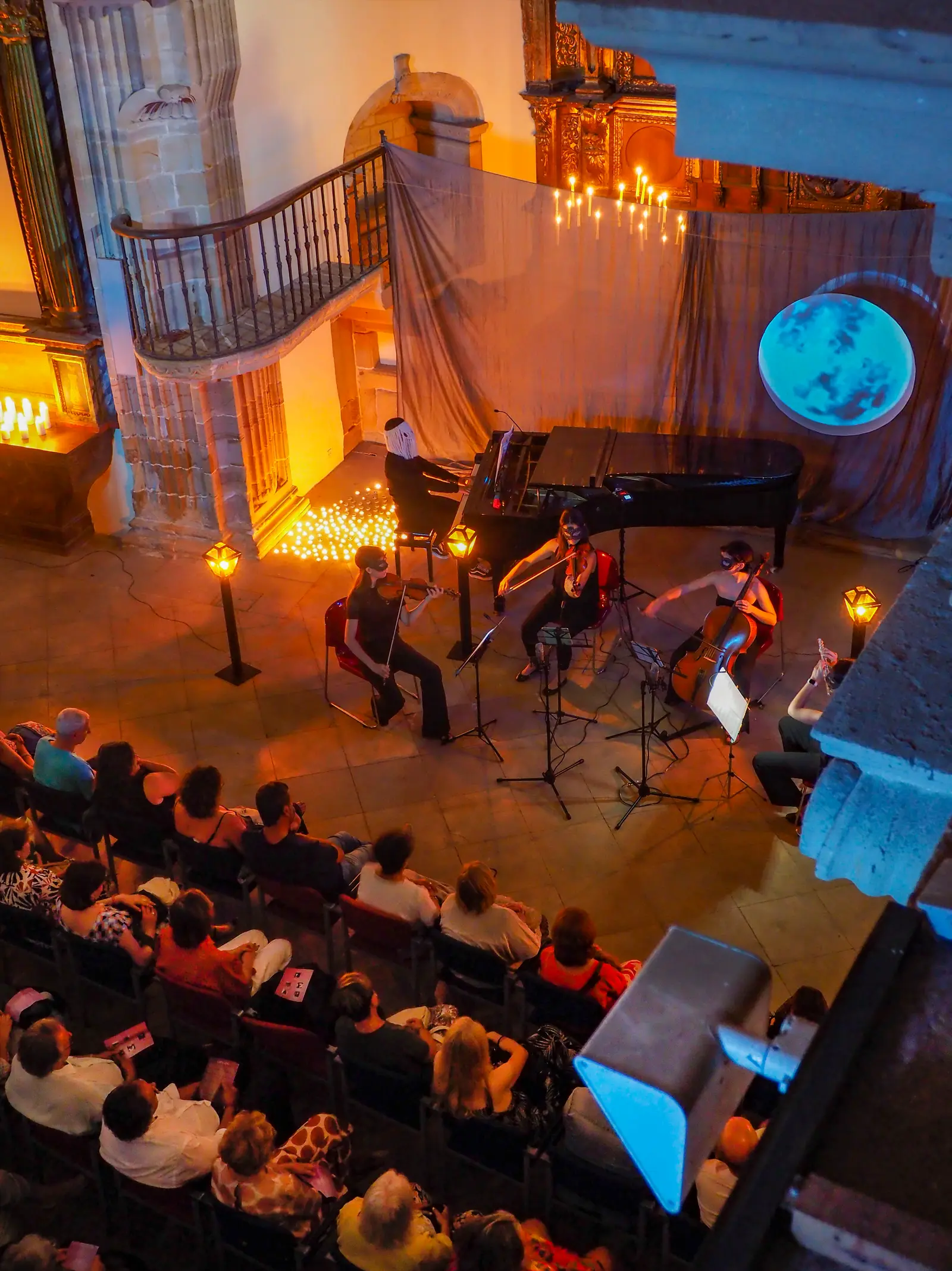 The musicians on stage, seen from above